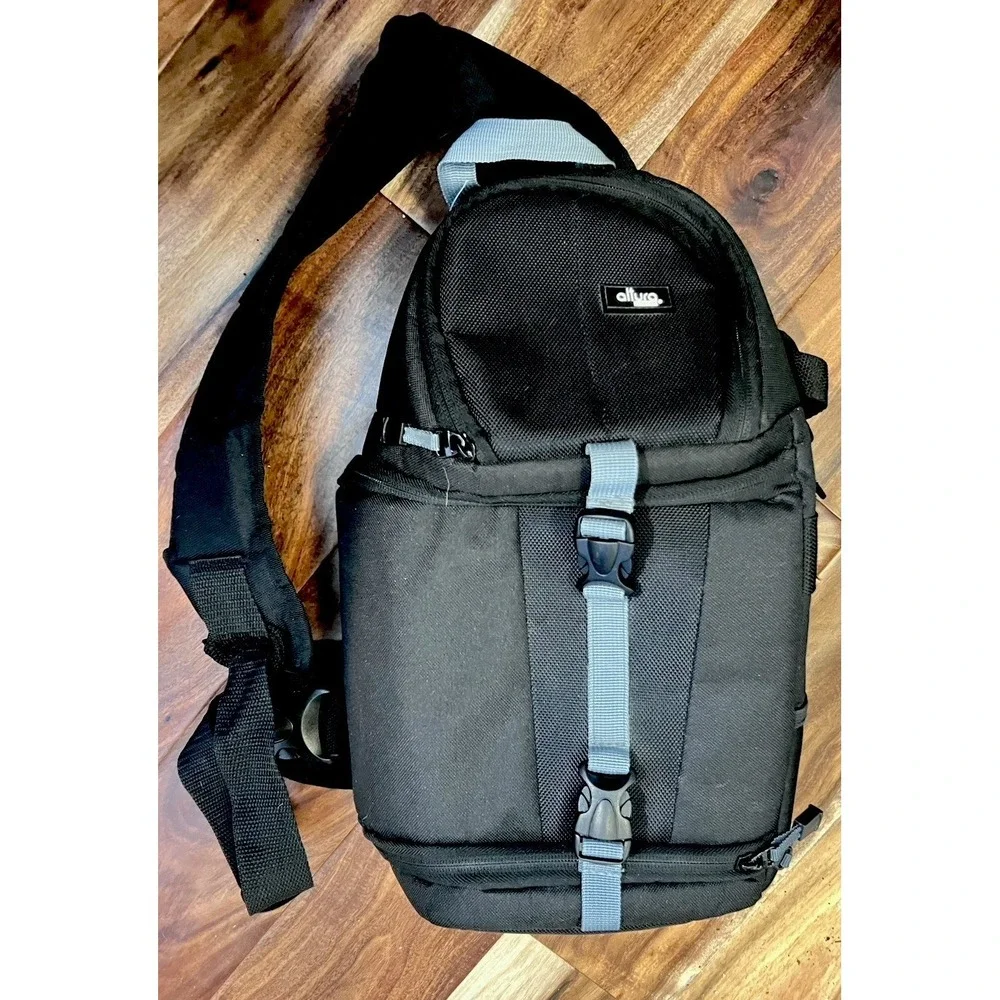 Black Alturo Slingshot Bag- Padded Two Compartments‎ Adjustable Inserts Purple